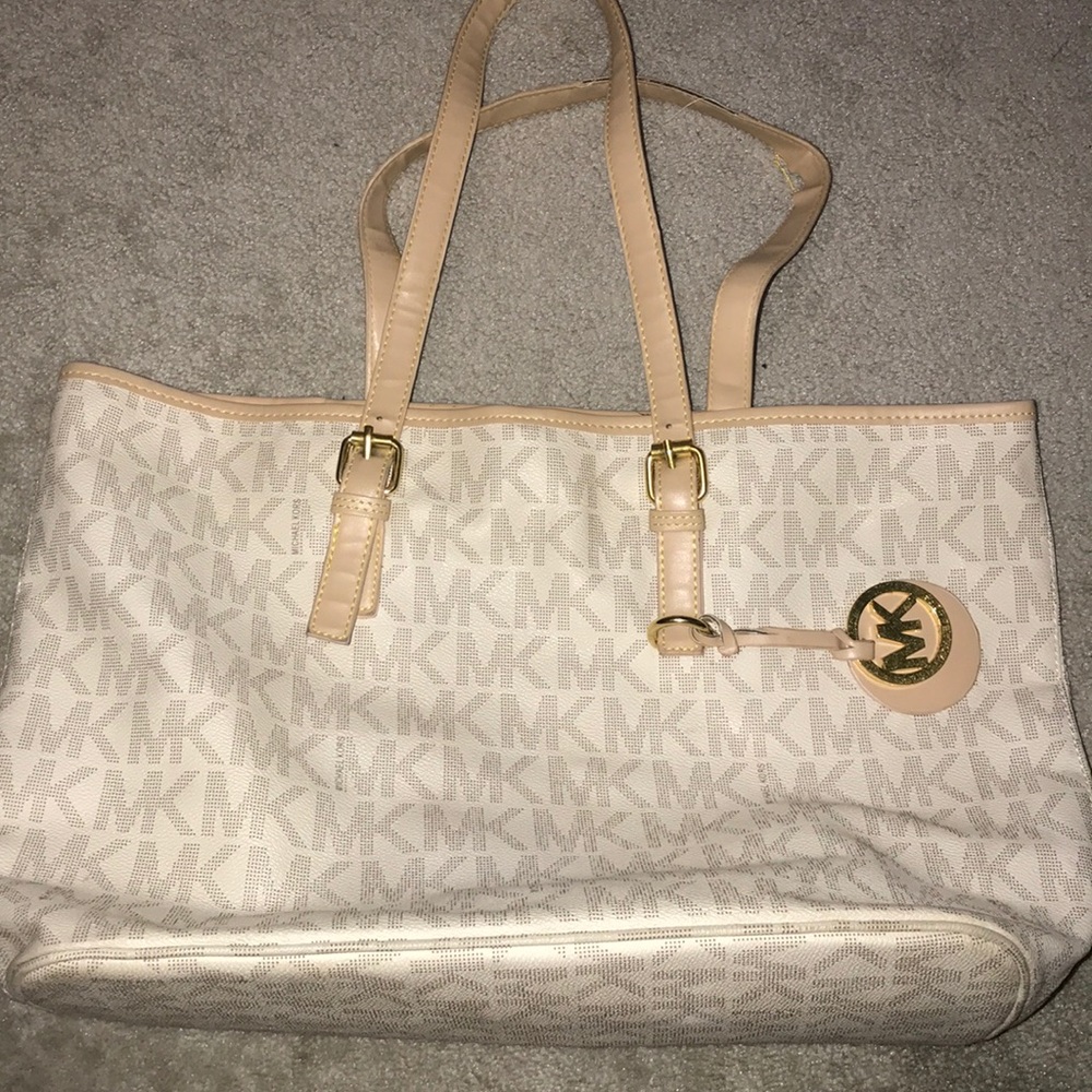 MK purse. Negotiations are welcome